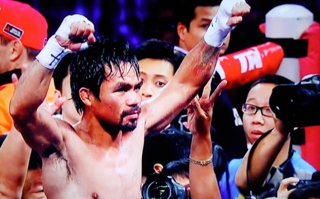 Pacquiao vs Algieri - Manny Pacquiao celebrates shutout win over Chris Algieri