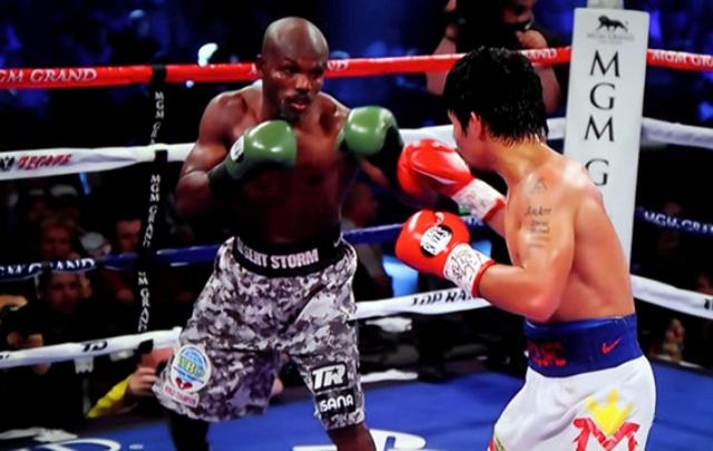 Pacquiao vs Bradley II - Manny Pacquiao and Timothy Bradley fight center ring 