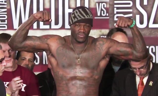 Deontay Wilder poses for cameras at Wilder vs Szpilka Weigh-In